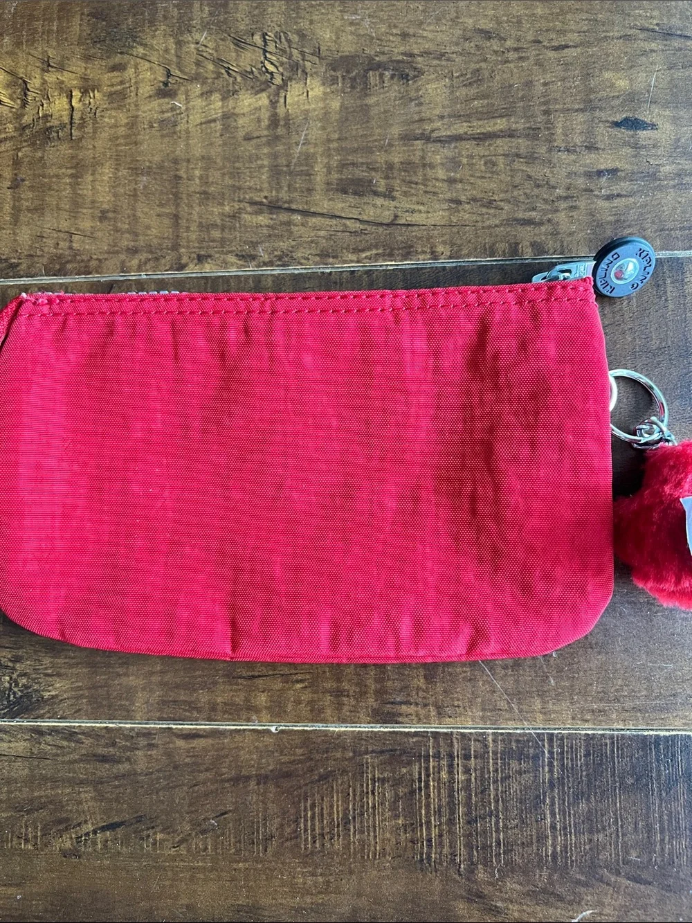 Kipling Bright Red Zip Pouch with Monkey Charm